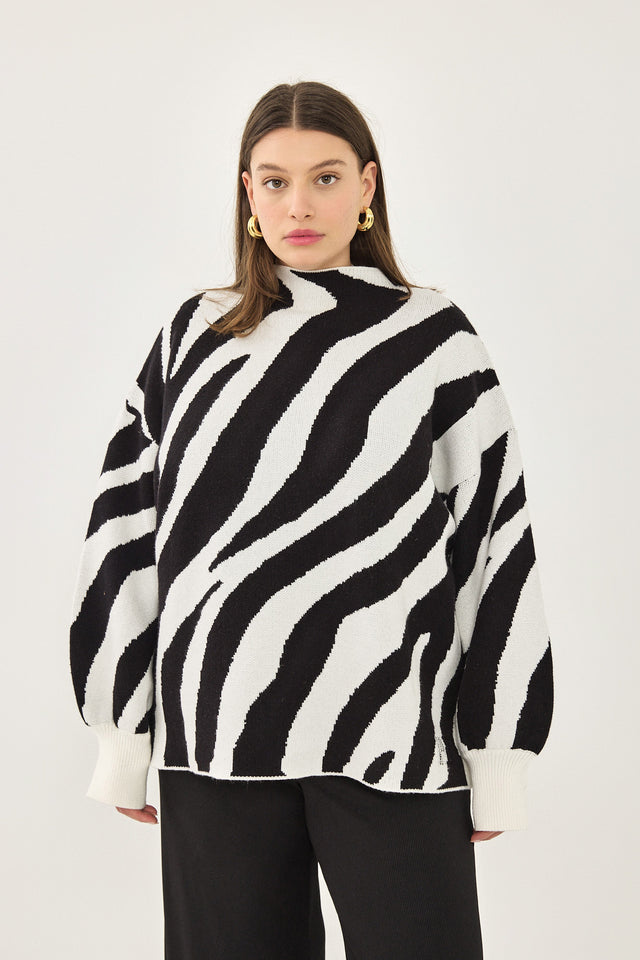 סוודר פרזנט שרוולים תפוחים שרוולים תפוחים מנומר שמנת