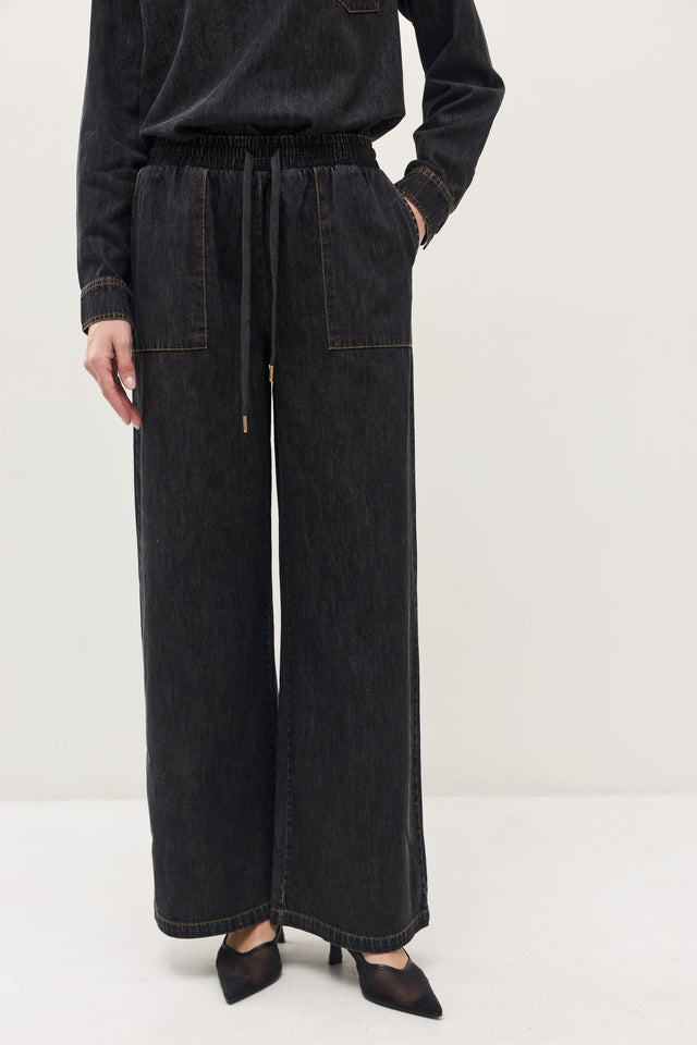 מכנסי ג'ינס זואי גומי במתניים וואש שחור