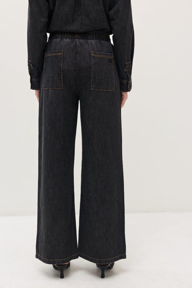 מכנסי ג'ינס זואי גומי במתניים וואש שחור