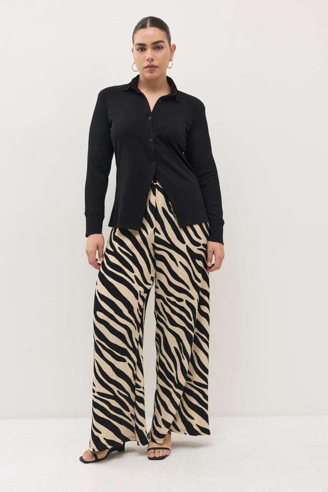 מכנסיים ספיריט פליסה בז׳ שחור