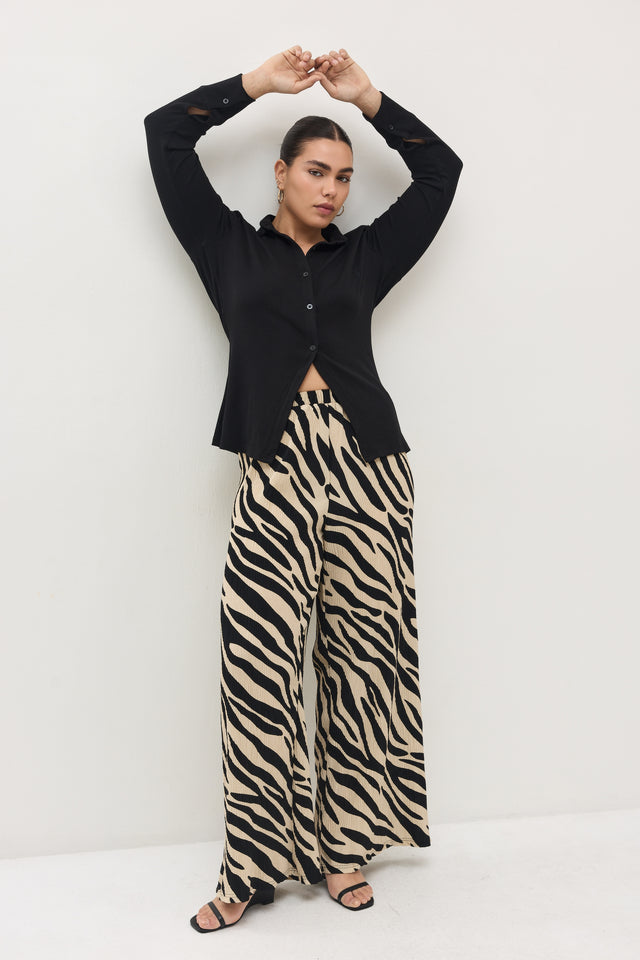 מכנסיים ספיריט פליסה בז׳ שחור