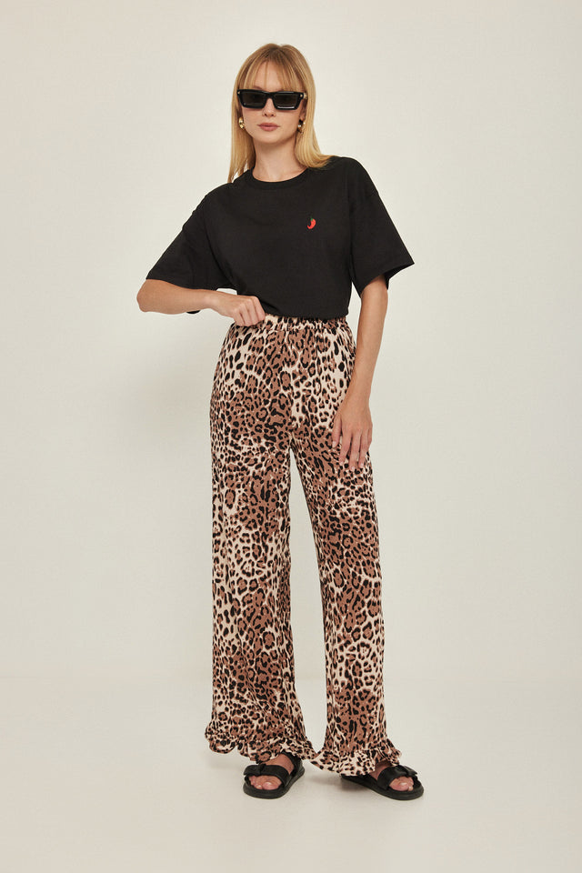 מכנסיים וייב כותנה גומי ודיטייל פפלום ארוכים מנומרים