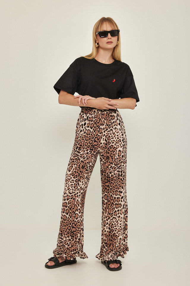 מכנסיים וייב כותנה גומי ודיטייל פפלום ארוכים מנומרים