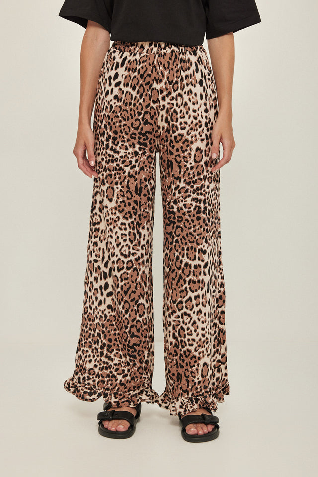 מכנסיים וייב כותנה גומי ודיטייל פפלום ארוכים מנומרים