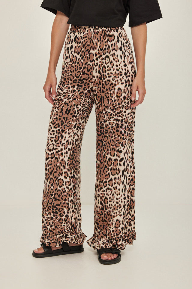 מכנסיים וייב כותנה גומי ודיטייל פפלום ארוכים מנומרים