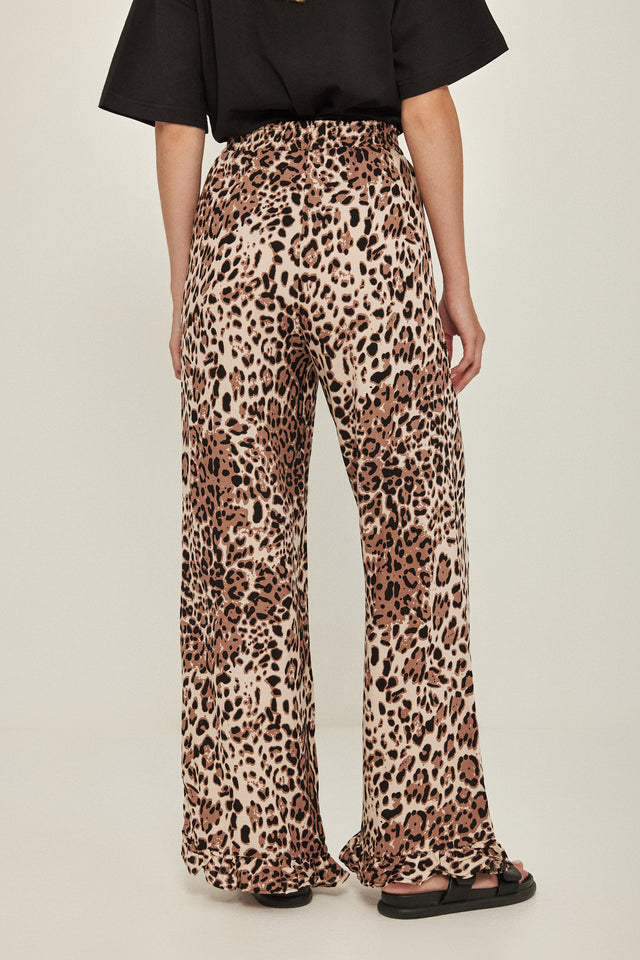 מכנסיים וייב כותנה גומי ודיטייל פפלום ארוכים מנומרים