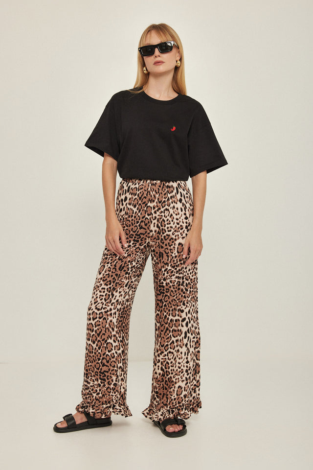 מכנסיים וייב כותנה גומי ודיטייל פפלום ארוכים מנומרים