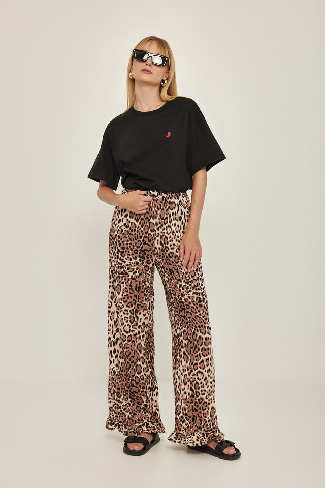 מכנסיים וייב כותנה גומי ודיטייל פפלום ארוכים מנומרים