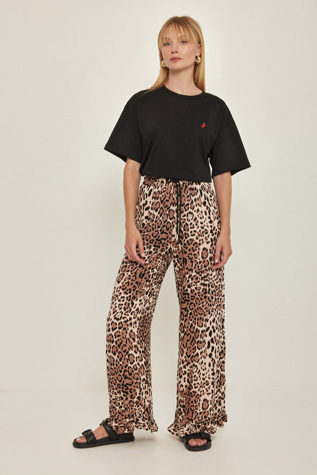 מכנסיים וייב כותנה גומי ודיטייל פפלום ארוכים מנומרים