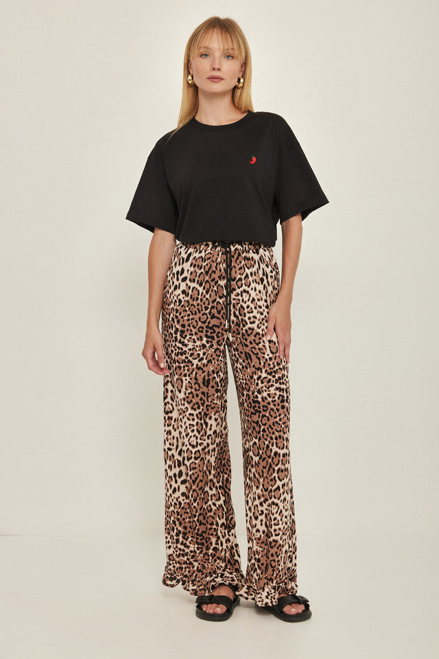 מכנסיים וייב כותנה גומי ודיטייל פפלום ארוכים מנומרים