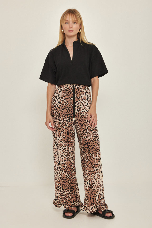 מכנסיים וייב כותנה גומי ודיטייל פפלום ארוכים מנומרים