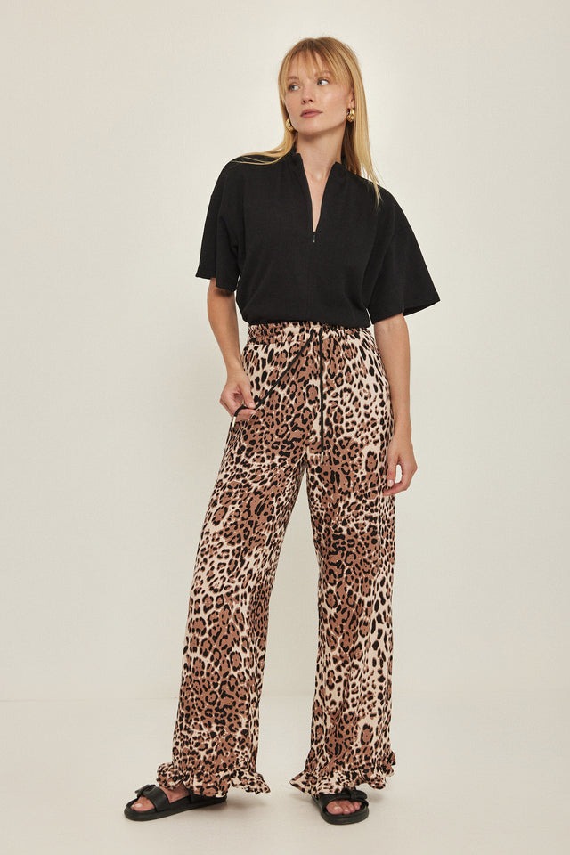 מכנסיים וייב כותנה גומי ודיטייל פפלום ארוכים מנומרים