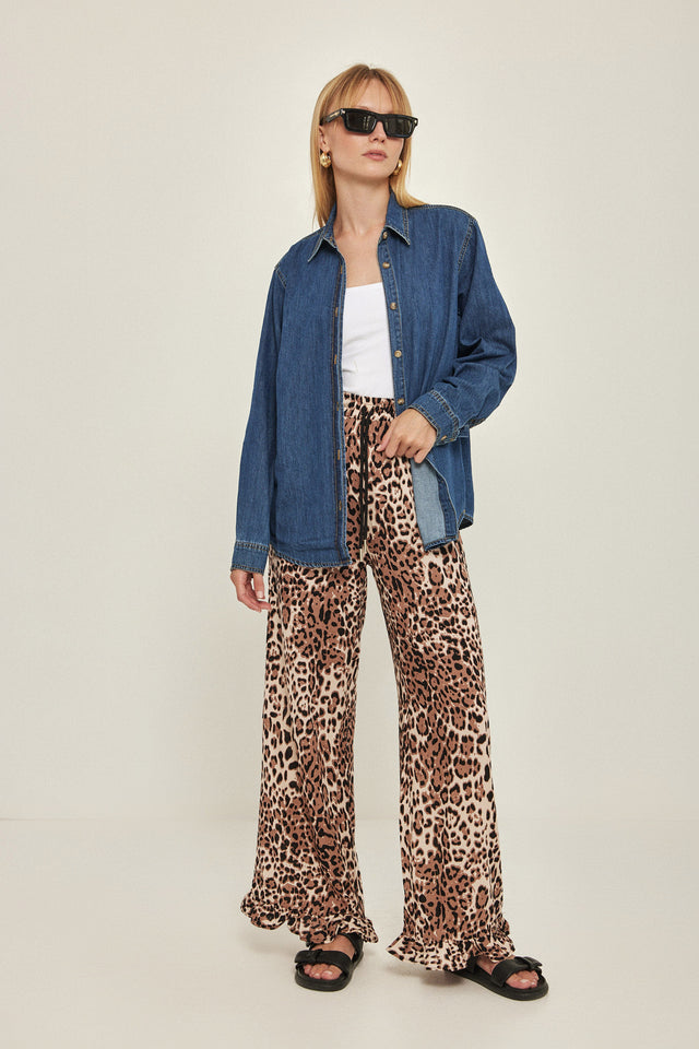 מכנסיים וייב כותנה גומי ודיטייל פפלום ארוכים מנומרים