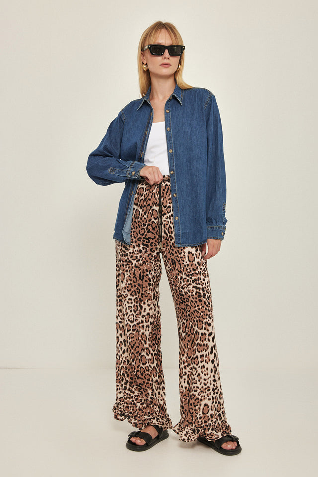 מכנסיים וייב כותנה גומי ודיטייל פפלום ארוכים מנומרים