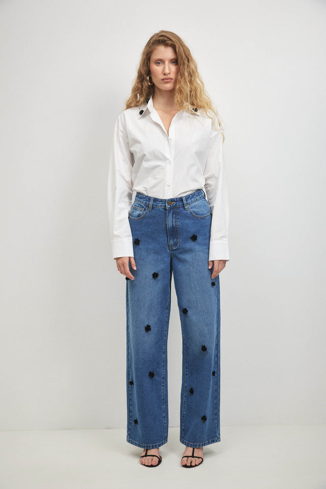 מכנסי ג'ינס פלוראל וואש כחול