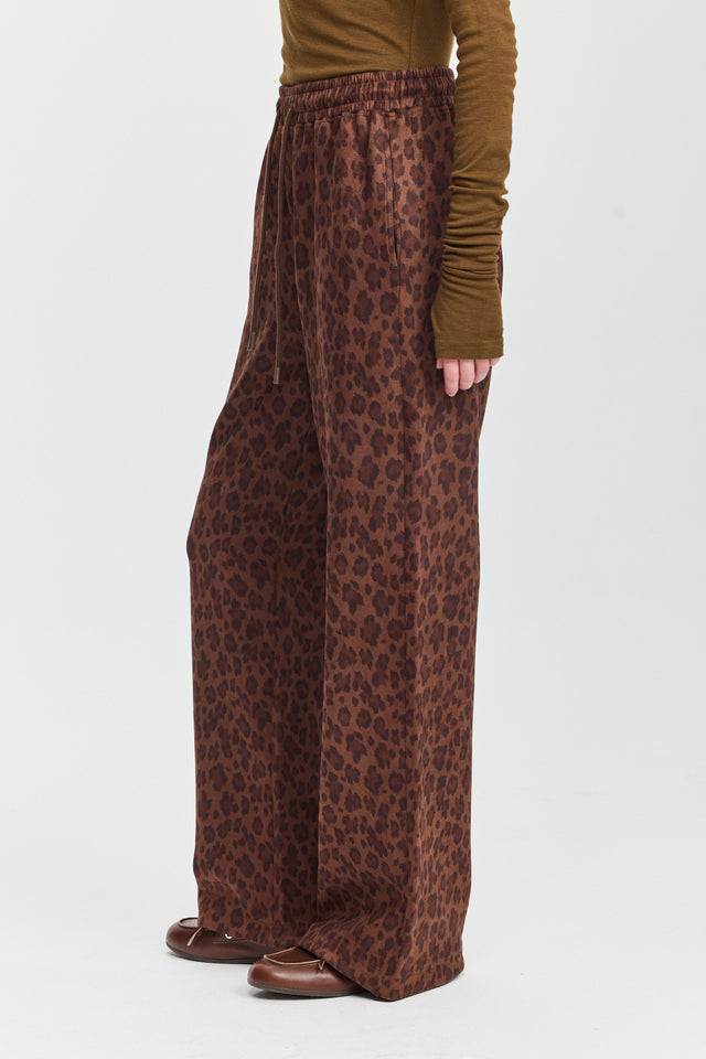 מכנסיים מתרחבים מזמש מנומר עם גומי ושרוכים