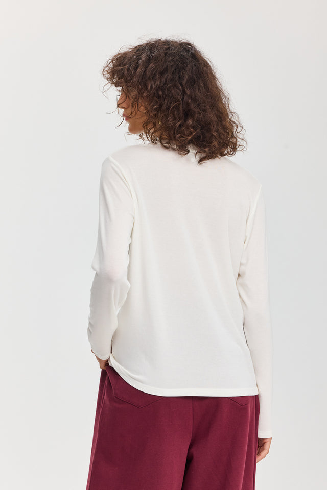 חולצת קוקיז מפתח וי לבנה