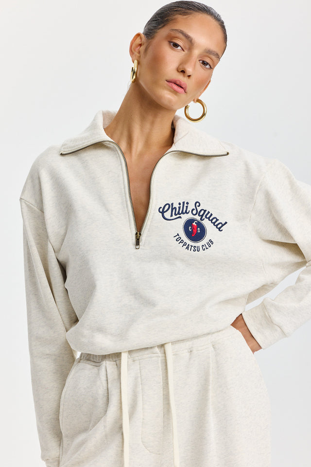 סווטשירט זיפר ספייסי צ'ילי סקווד שמנת מלאנז'