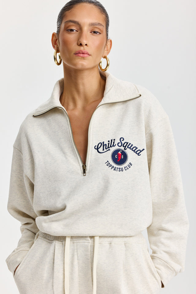 סווטשירט זיפר ספייסי צ'ילי סקווד שמנת מלאנז'
