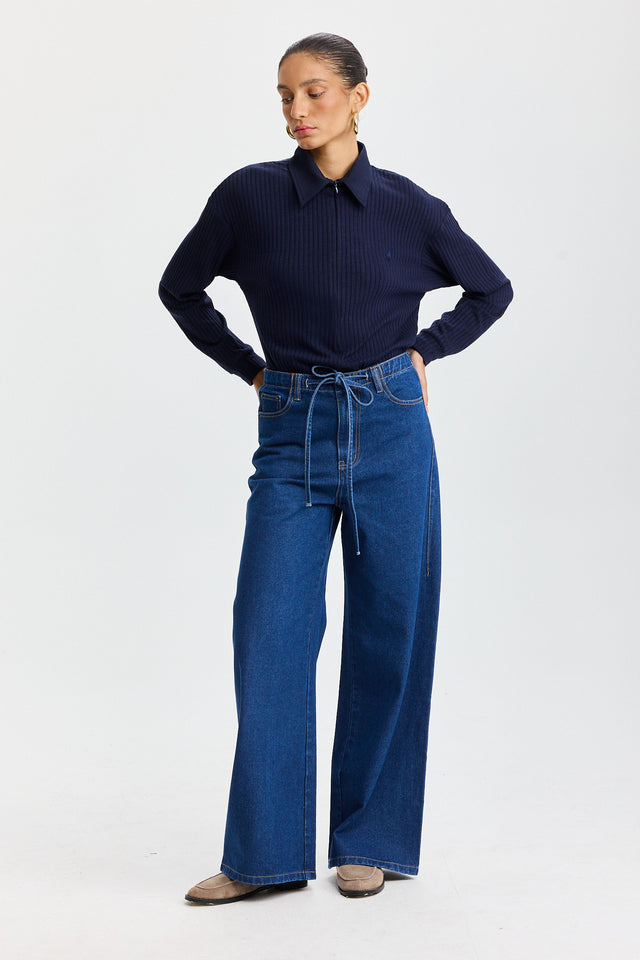 מכנסי ג'ינס טופו מתרחבים קשירה כחול כהה