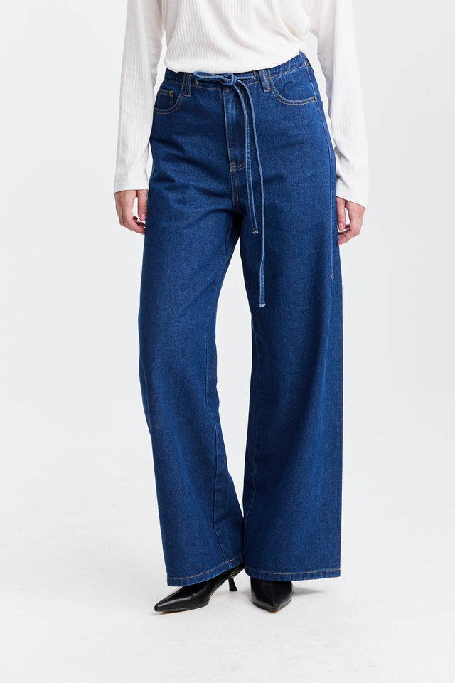 מכנסי ג'ינס טופו מתרחבים קשירה כחול כהה
