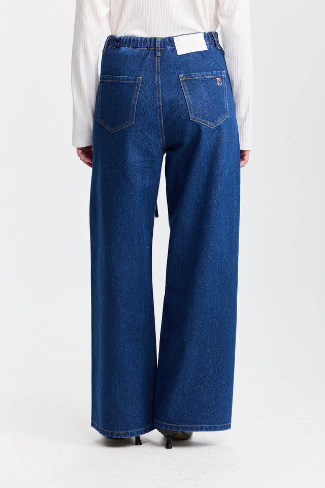 מכנסי ג'ינס טופו מתרחבים קשירה כחול כהה