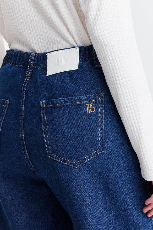 מכנסי ג'ינס טופו מתרחבים קשירה כחול כהה