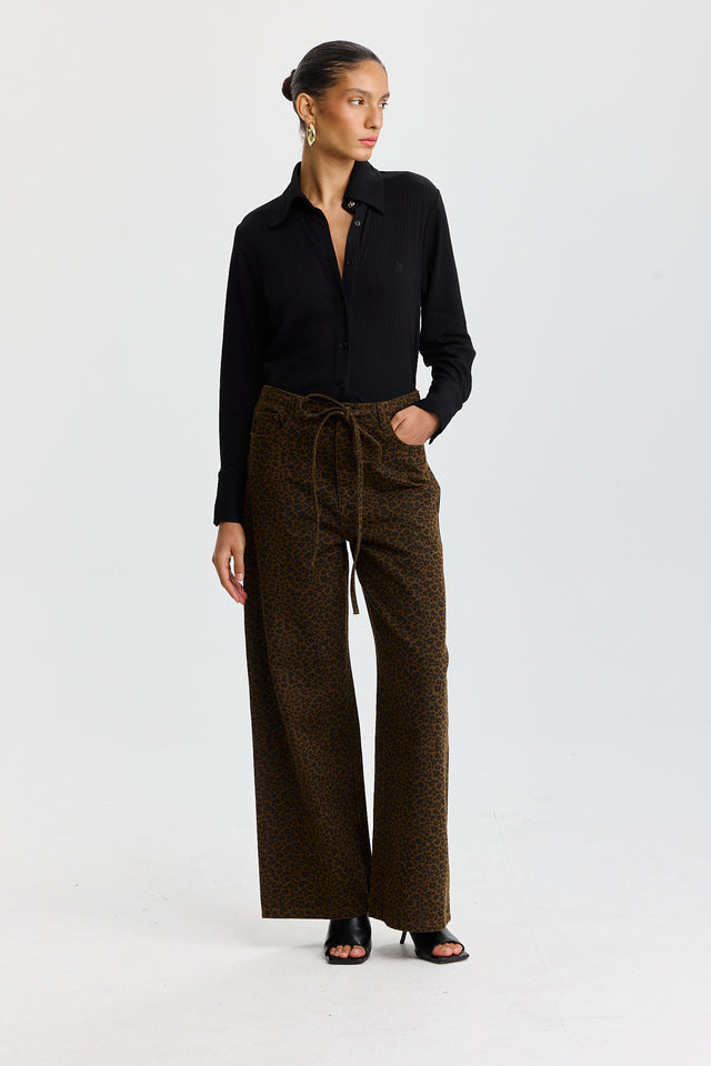 מכנסי ג'ינס טופו מתרחבים קשירה מנומרים