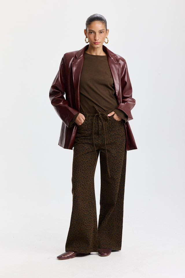 מכנסי ג'ינס טופו מתרחבים קשירה מנומרים