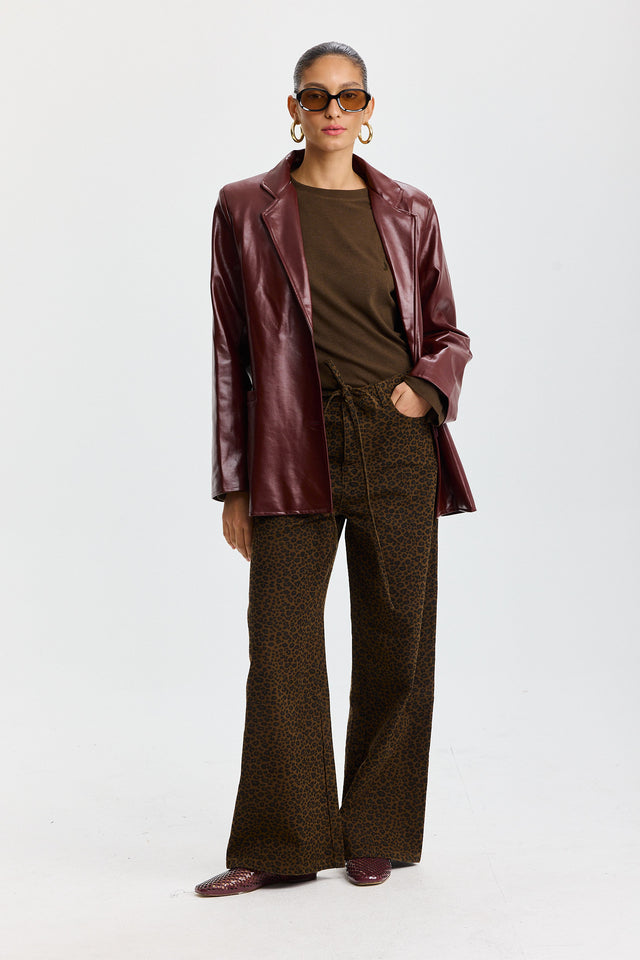 מכנסי ג'ינס טופו מתרחבים קשירה מנומרים