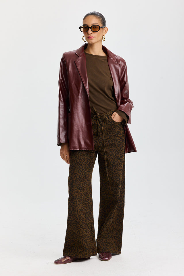 מכנסי ג'ינס טופו מתרחבים קשירה מנומרים