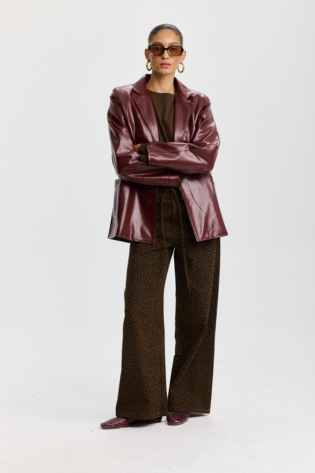 מכנסי ג'ינס טופו מתרחבים קשירה מנומרים