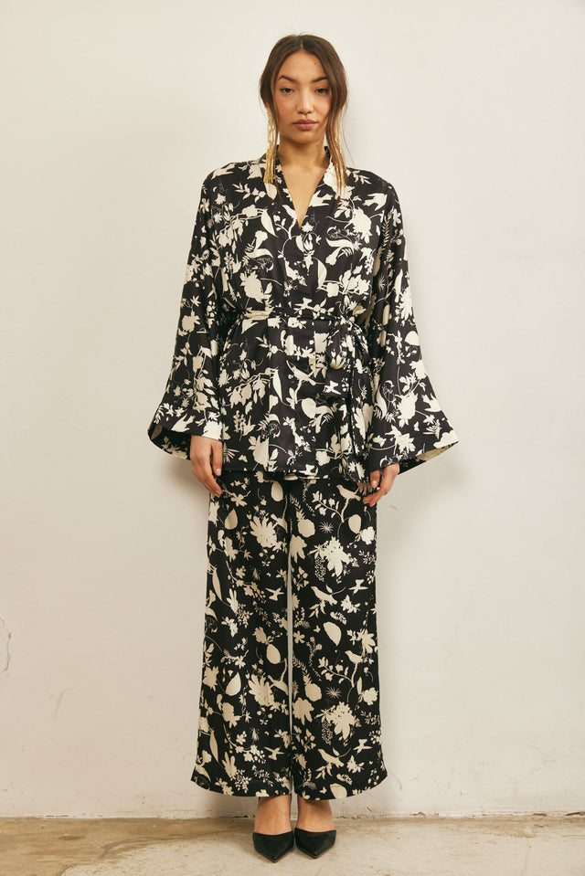 מכנסי סאטן מתרחבים שחור שמנת