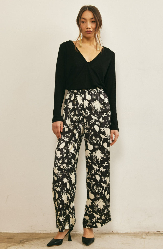 מכנסי סאטן מתרחבים שחור שמנת