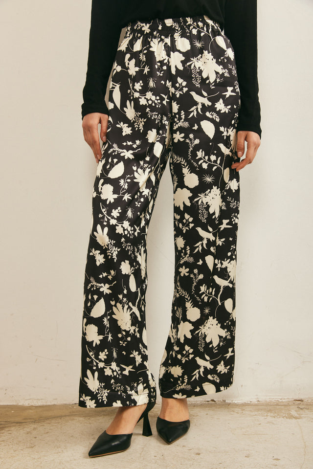 מכנסי סאטן מתרחבים שחור שמנת