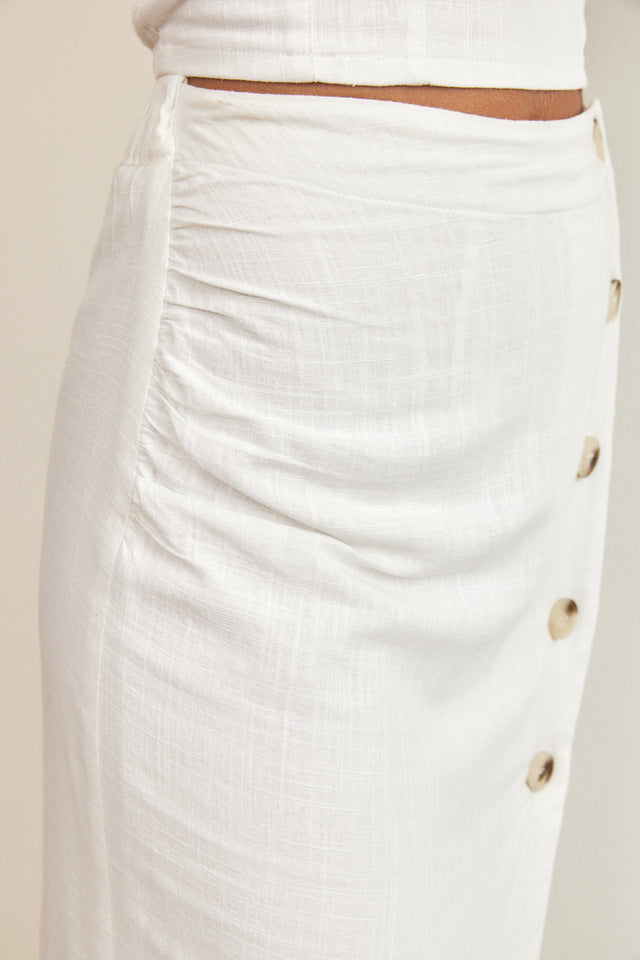 חצאית כפתורים פשתן לבנה