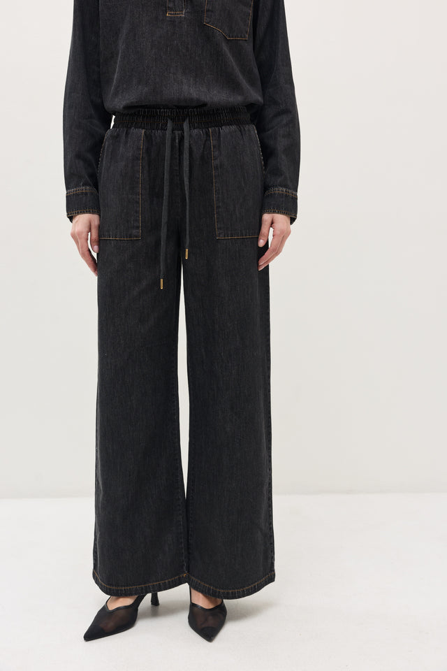 מכנסי ג'ינס זואי גומי במתניים וואש שחור