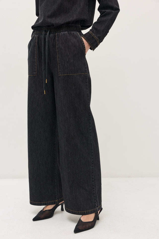 מכנסי ג'ינס זואי גומי במתניים וואש שחור