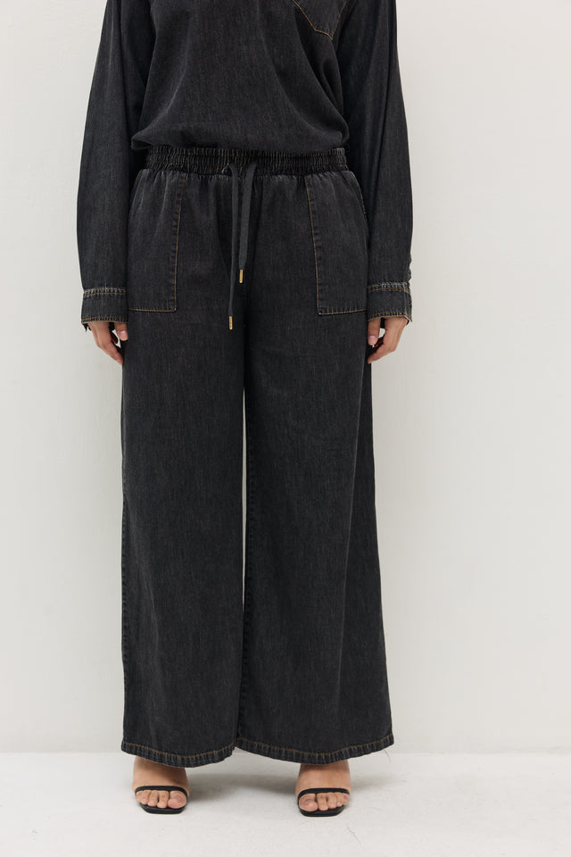 מכנסי ג'ינס זואי גומי במתניים וואש שחור