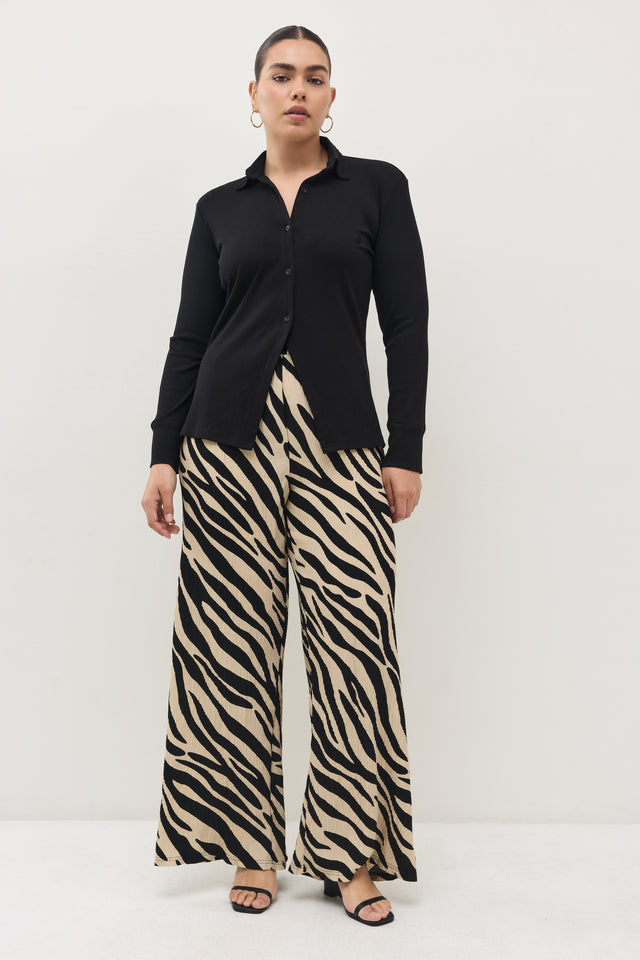 מכנסיים ספיריט פליסה בז׳ שחור