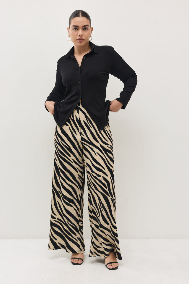 מכנסיים ספיריט פליסה בז׳ שחור