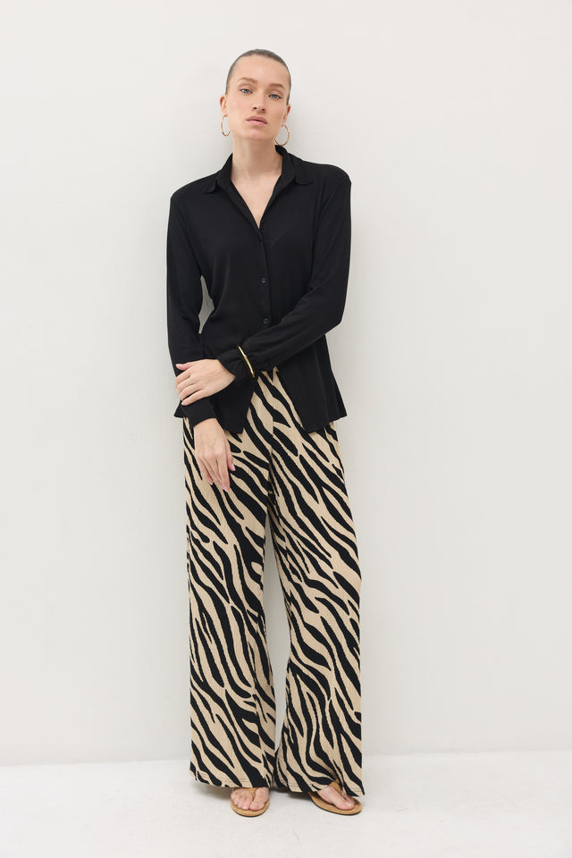 מכנסיים ספיריט פליסה בז׳ שחור