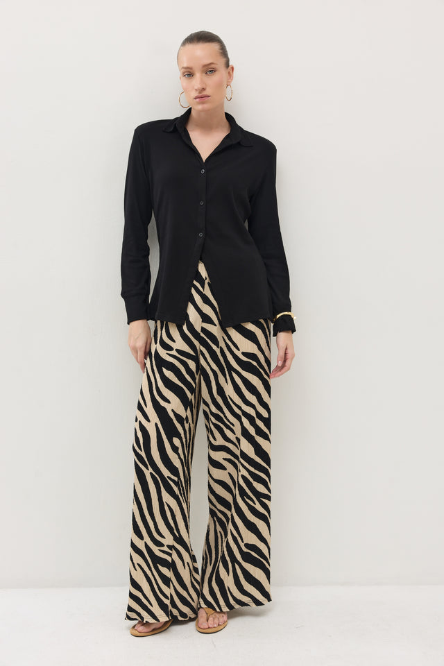 מכנסיים ספיריט פליסה בז׳ שחור