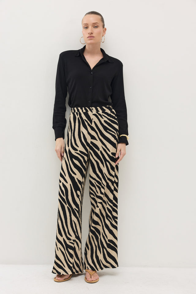 מכנסיים ספיריט פליסה בז׳ שחור