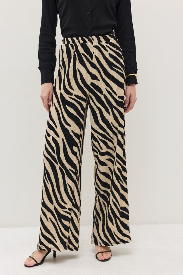 מכנסיים ספיריט פליסה בז׳ שחור