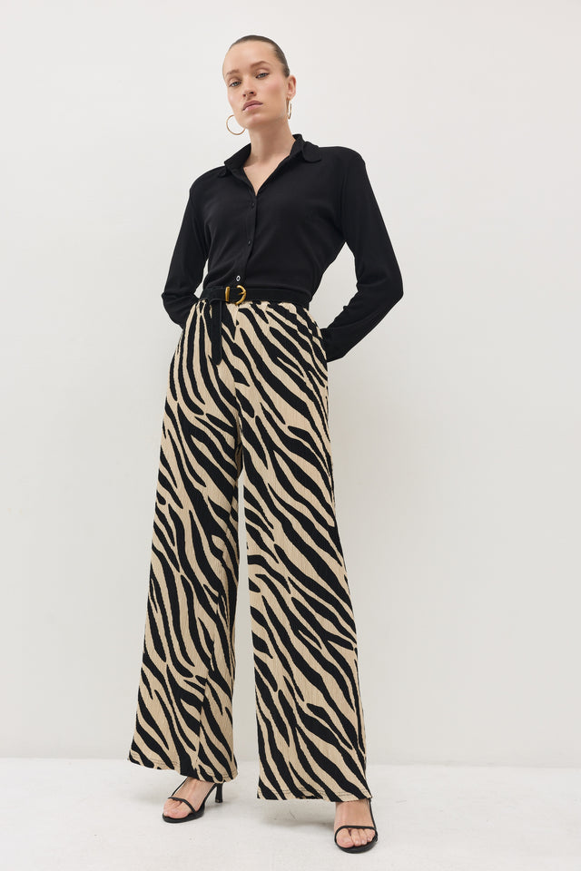 מכנסיים ספיריט פליסה בז׳ שחור