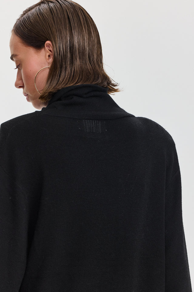 חולצת גולף סריג פריס שחורה