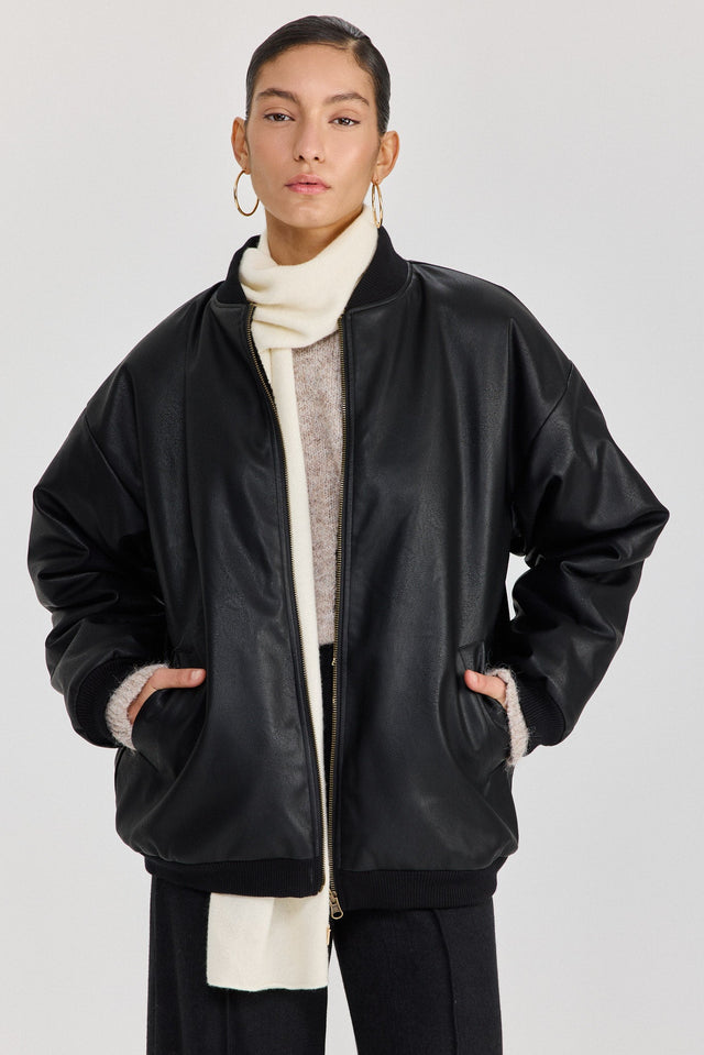 מעיל פנטאסי דו צדדי דמוי עור ופרווה שחור