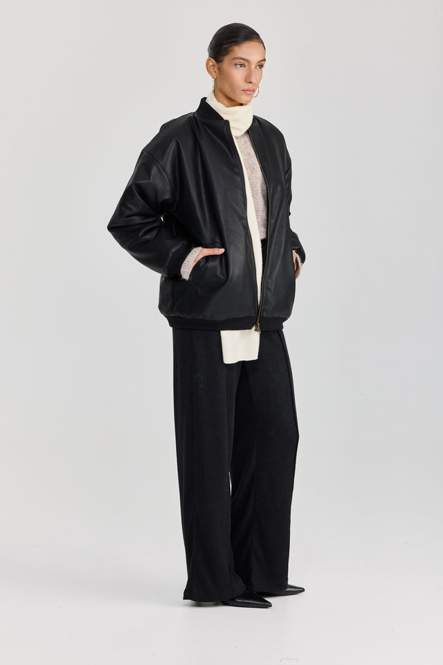 מעיל פנטאסי דו צדדי דמוי עור ופרווה שחור