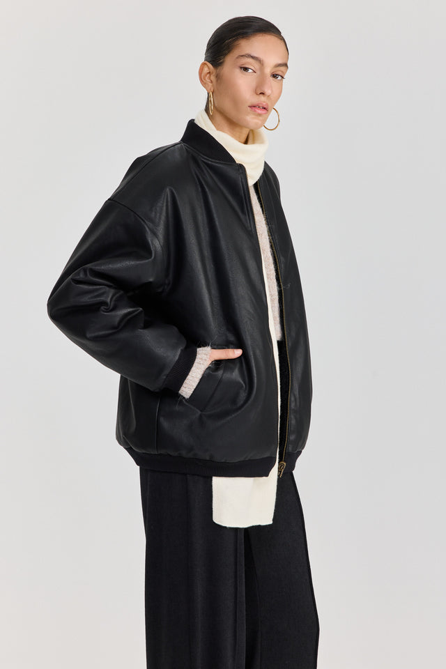 מעיל פנטאסי דו צדדי דמוי עור ופרווה שחור
